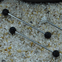 Industrial barbell with multi-gem covered balls