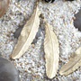 Brass double feather hanging design