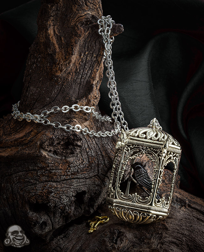White Metal Ornate Birdcage Necklace with Horn Bird